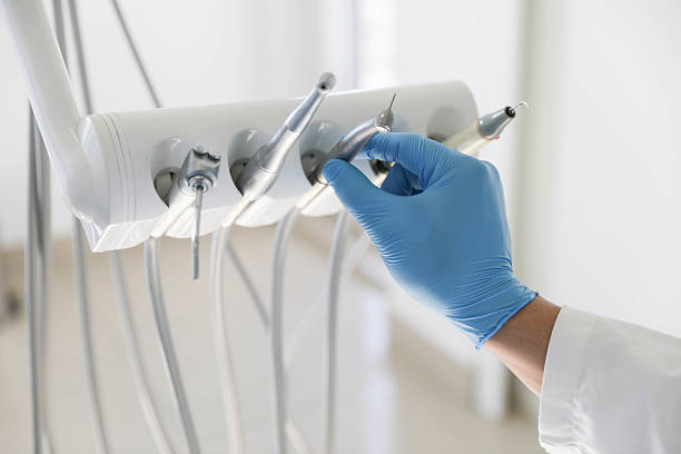 Professional Root Canal Treatment technician working in Lake of the Woods, IL